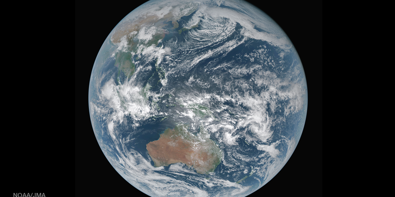 The Earth from space showing swirling clouds, oceans and continents