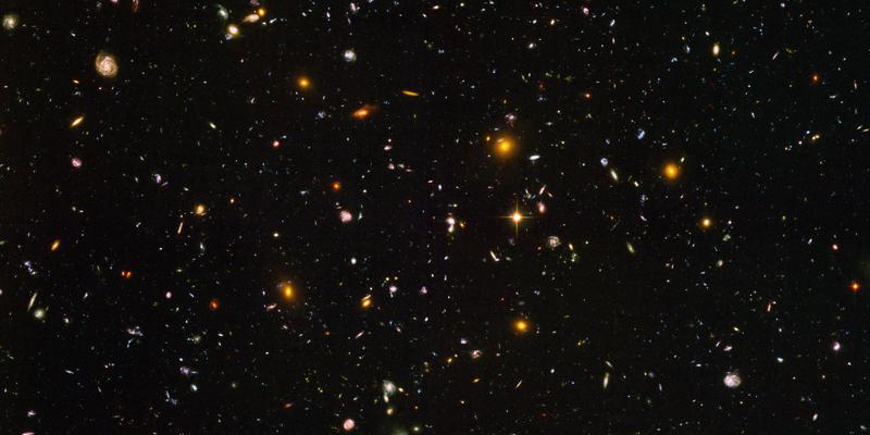 The Hubble Ultra Deep Field showing around 10,000 galaxies of various ages, sizes, shapes and colours.