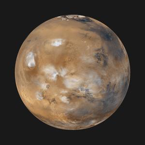 The planet Mars with a rusty red surface, volcanoes, valleys, craters, ice clouds and a white polar cap